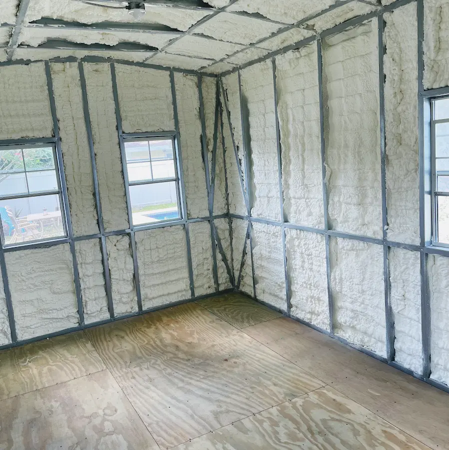 Closed-cell spray foam insulation applied to wall cavities in a residential project in Grove City